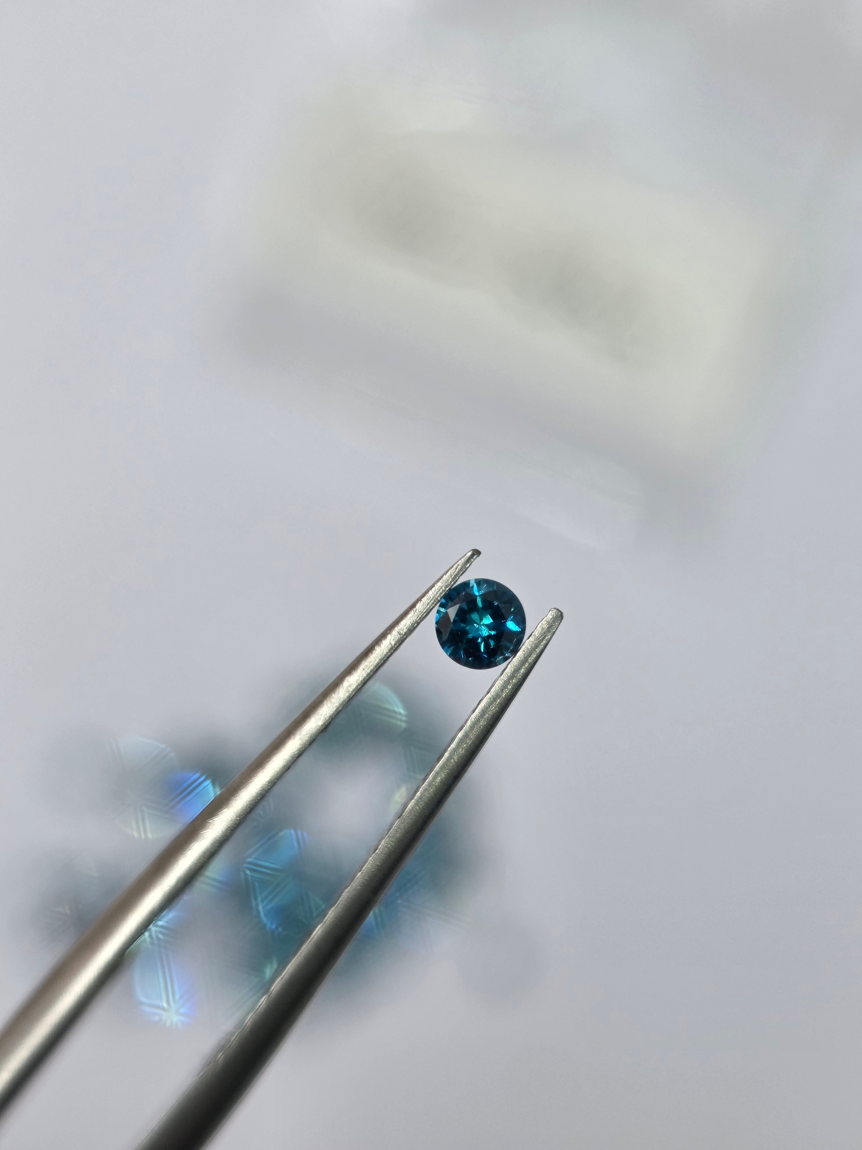 Diamante natural 0.07 ct (2.60–2.64 mm) | Color azul | Tratado