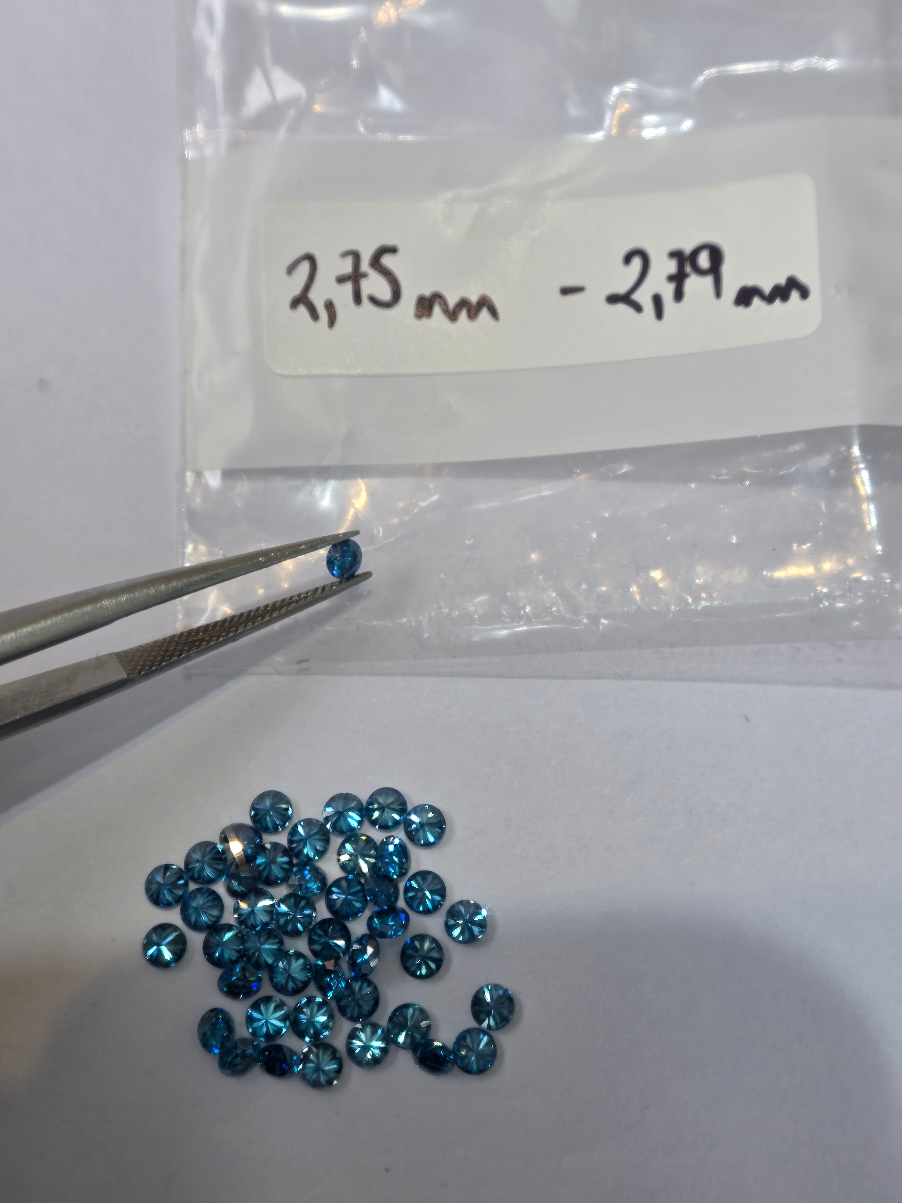 Diamante natural 0.08 ct (2.75–2.70 mm) | Color azul | Tratado