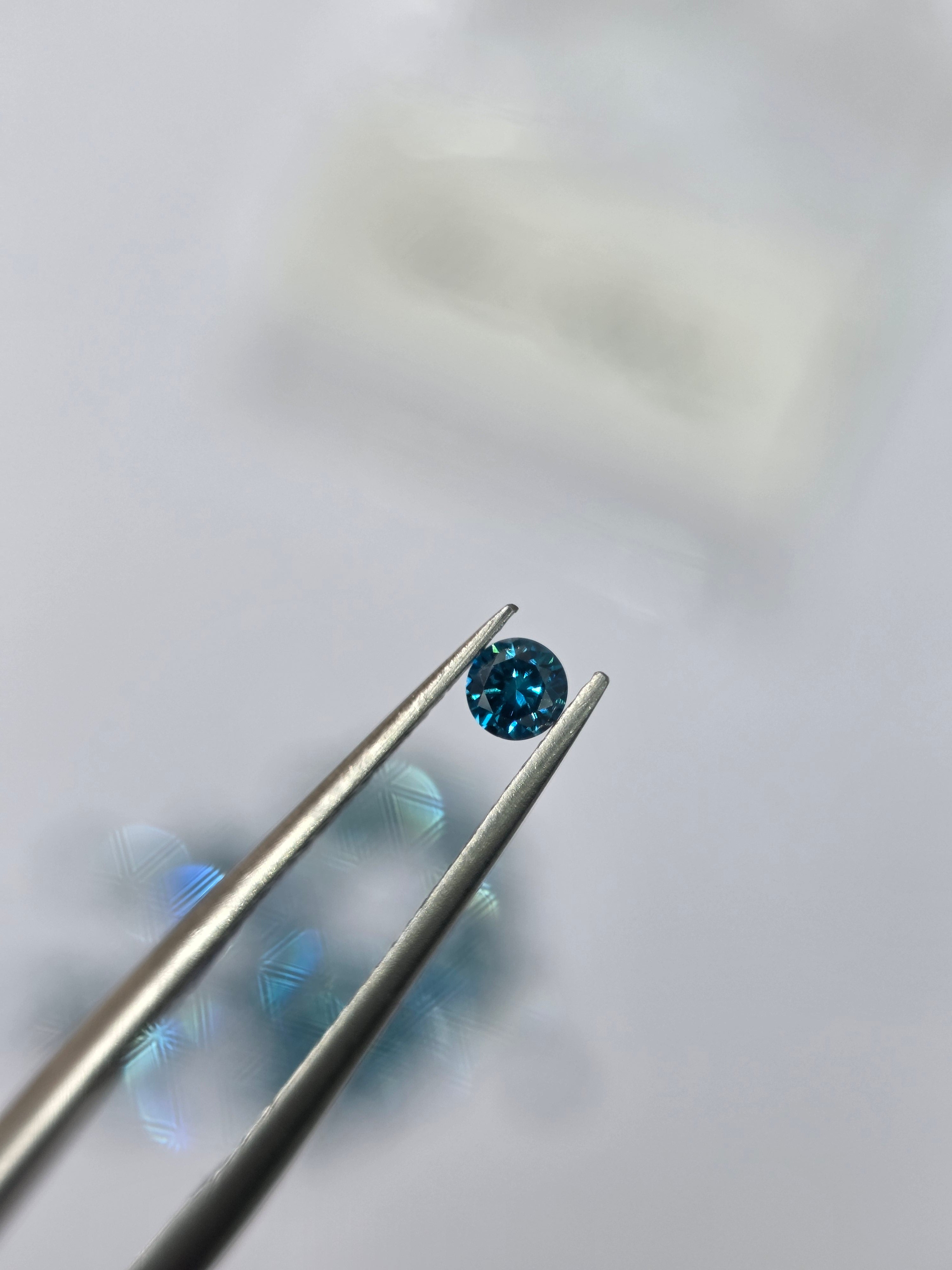 Diamante natural 0.07 ct (2.60–2.64 mm) | Color azul | Tratado
